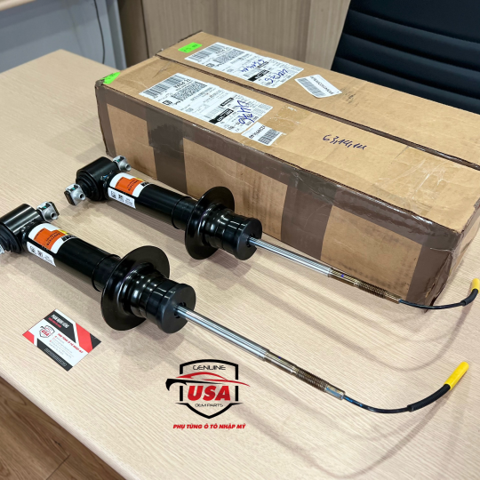 Phuộc nhúng trước Cadillac Ascalade 